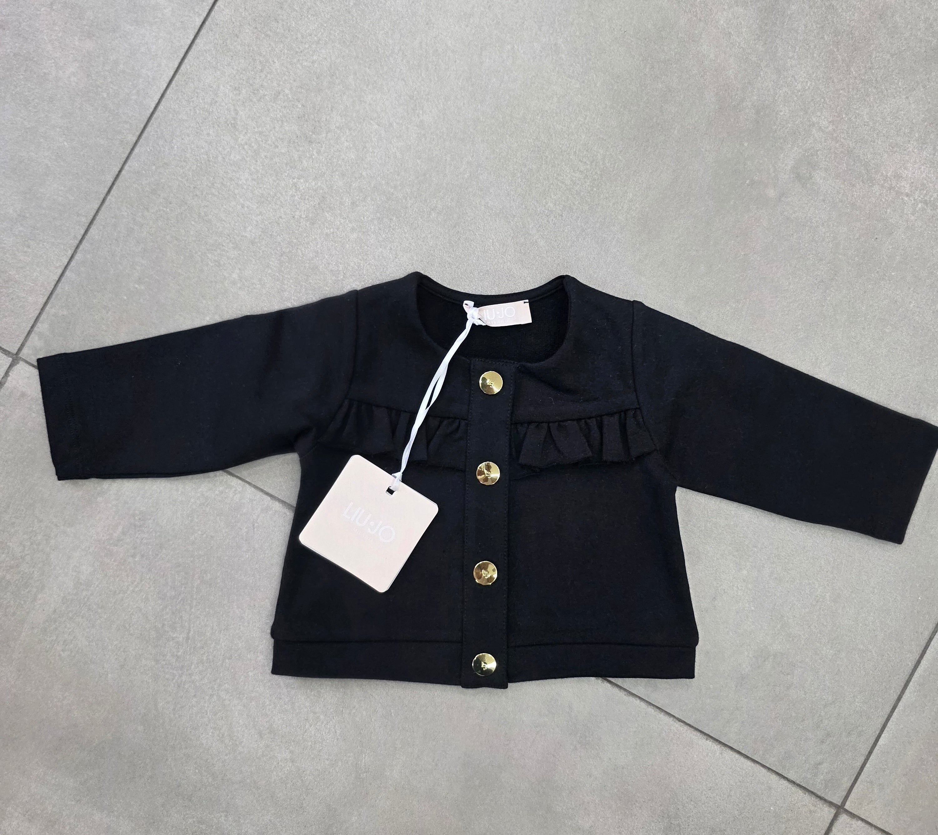 cardigan bottone con balza