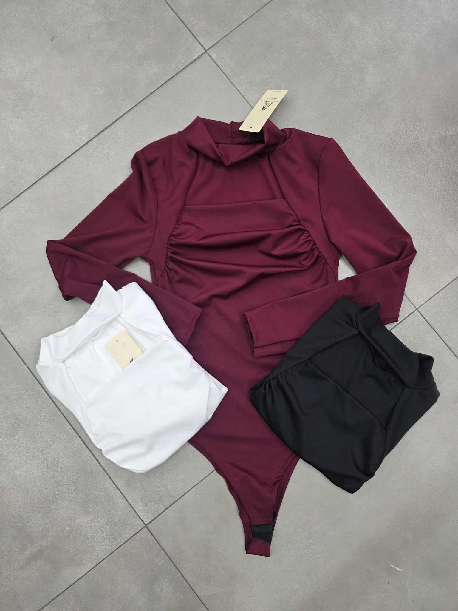 Body in lycra con apertura anterore e drappeggiato