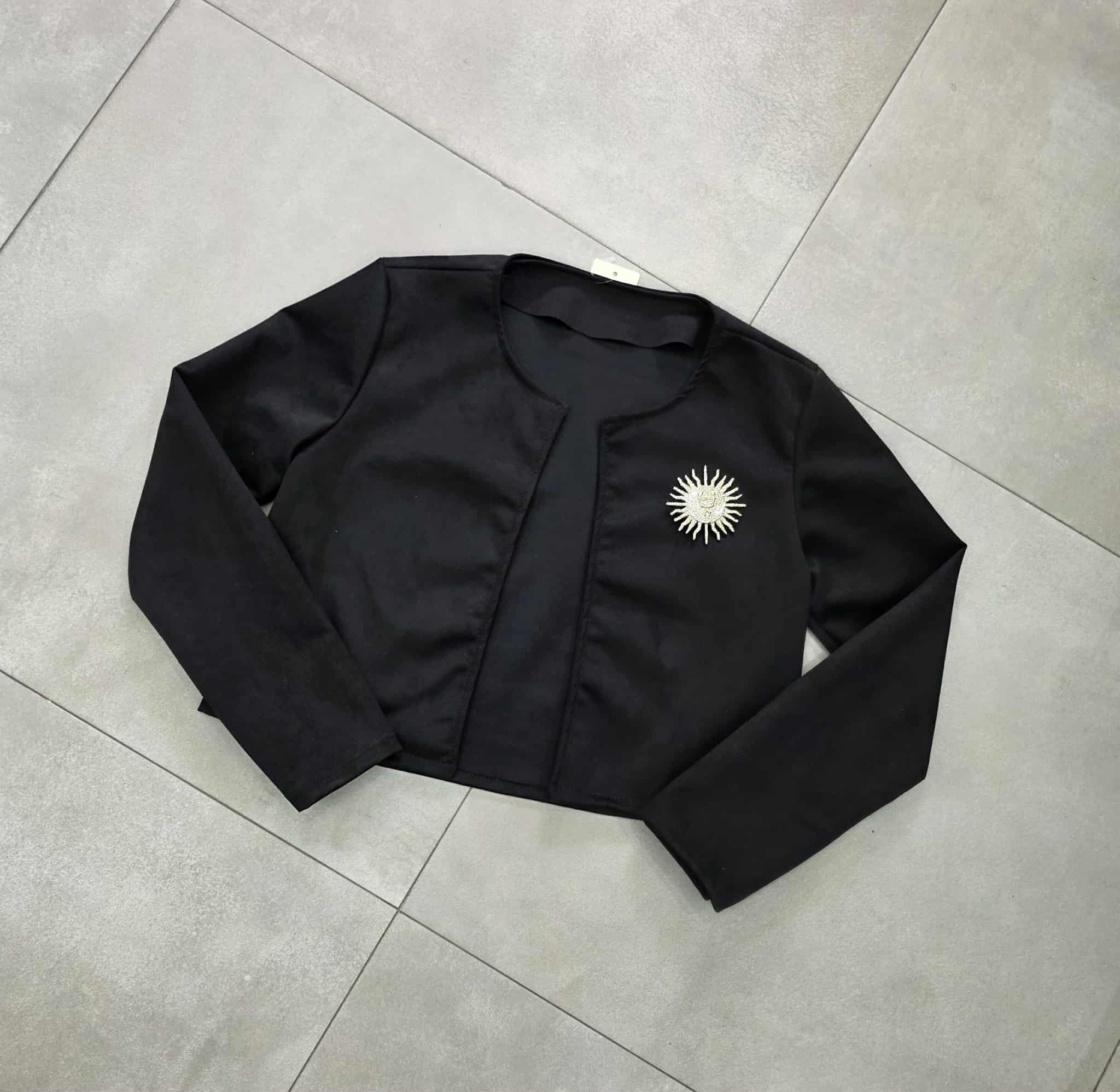 giacca aperta in camoscio con spilla sole