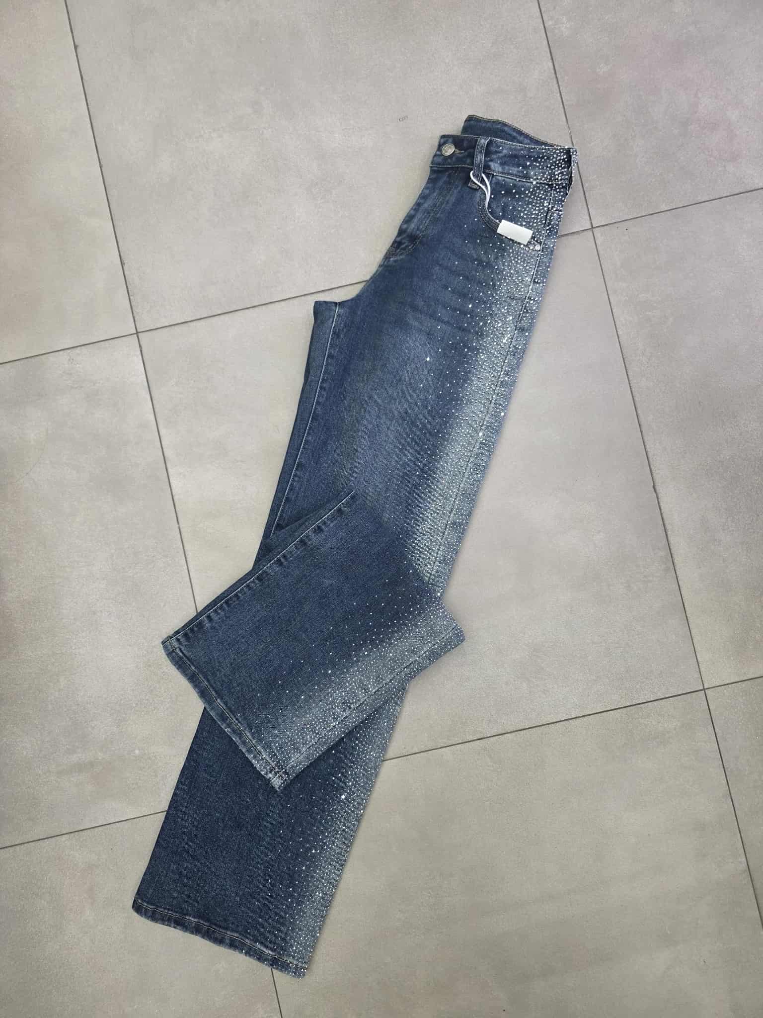 Jeans a palazzo con brillantini laterali