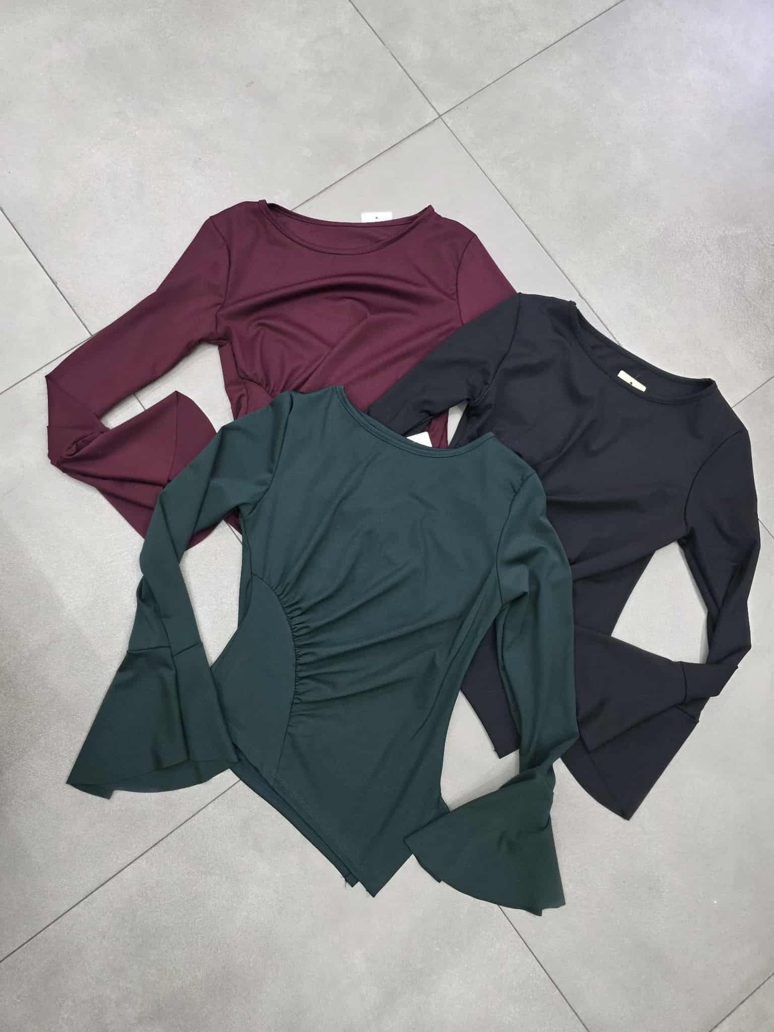 Maglia in lyrca diagonale manica pipistrello