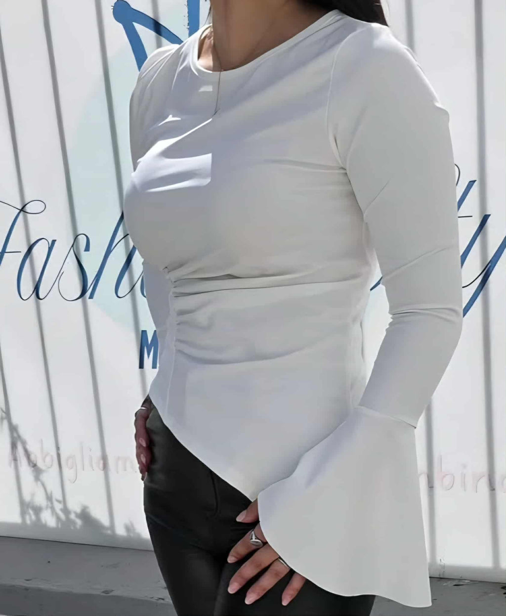 Maglia in lyrca diagonale manica pipistrello