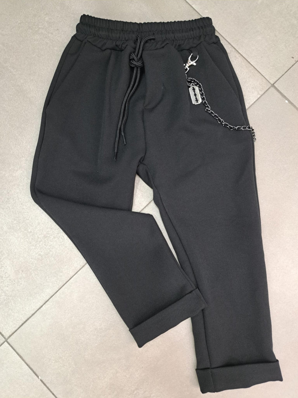 Pantalone con molla e catena laterale