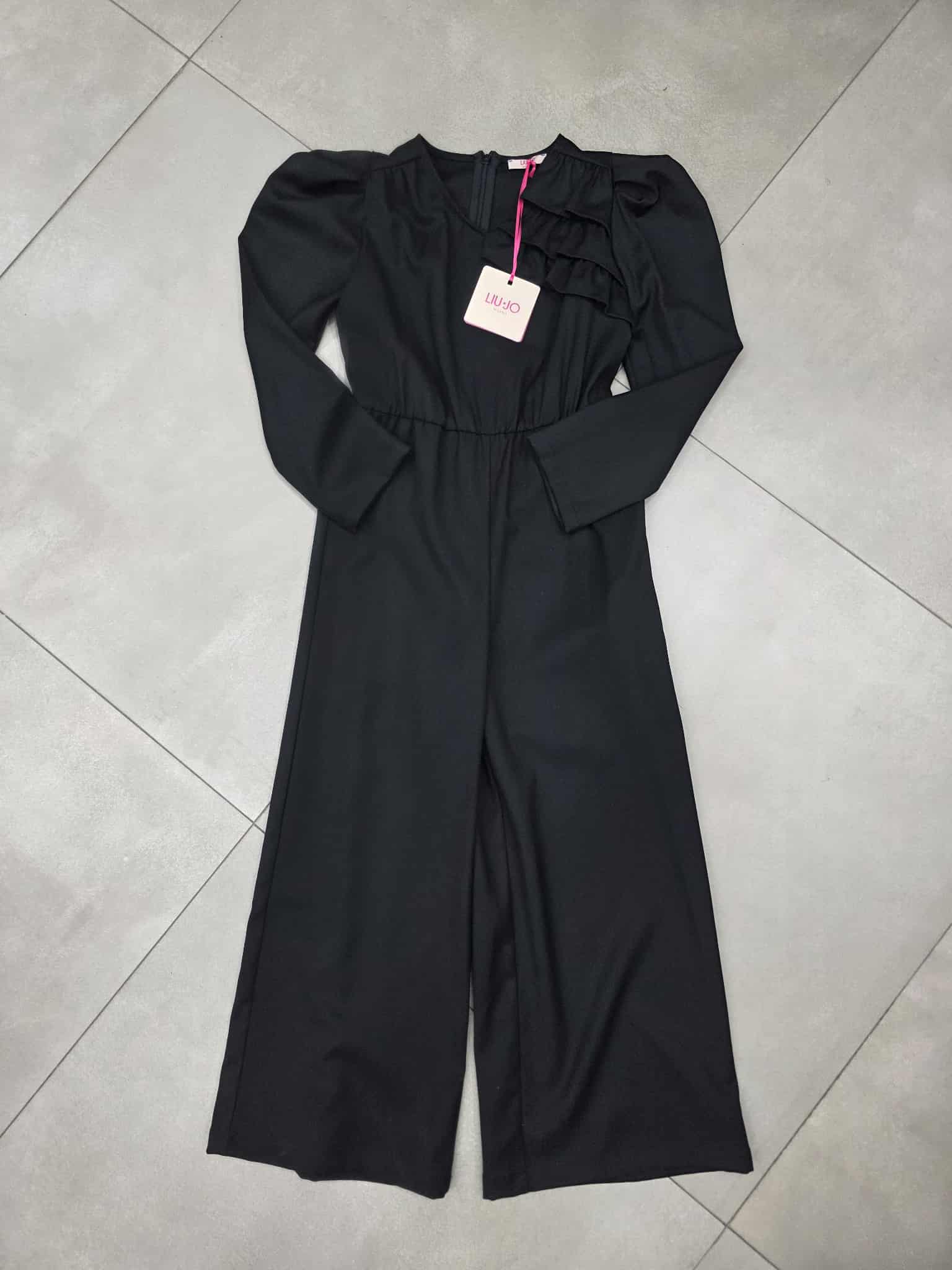 Tutone luijo con balze laterali e manica a palloncino